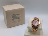 an image of a watch sitting on top of a white box