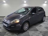 a picture of a small car parked in a garage