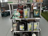 a stand with a lot of different products on it