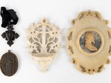 three pieces of carved ivory with a lady and a man