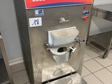 an image of a commercial ice cream machine in a commercial kitchen