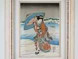 a picture of a woman holding an umbrella on the beach