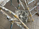 an image of a dirty chair with paint on it