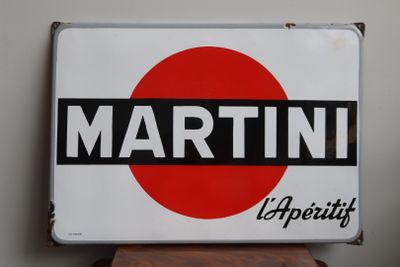 a white sign with a red circle on top of it