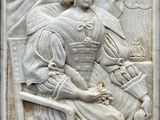 relief en marbre représentant une femme assise sur une chaise, tenant un oiseau dans la main