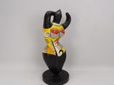 figurine of a cat with a guitar on a black stand