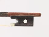 an image of a bow with a piece of wood sticking out of it