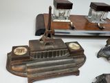 a small desk with a clock and a clock on top of it