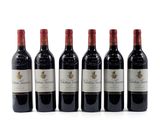 six bottles of red wine are lined up in a row