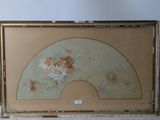 an old picture of a fan with flowers painted on it