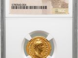 a gold coin with the image of a roman emperor on it