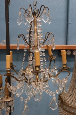 a chandelier that is hanging from the ceiling