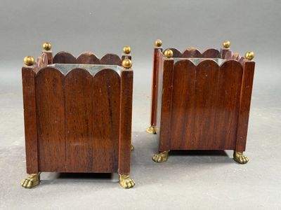 pair of antique mahogany bookends with brass feet