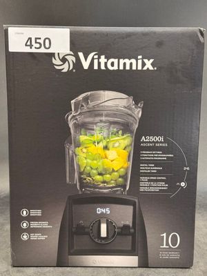 the box of a blender is sitting on the counter