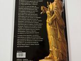 the back cover of a book with a statue of a woman holding a bird