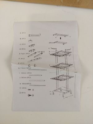 a drawing of a piece of paper on a table next to a piece of paper