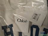 a white t - shirt with the name chloe on it
