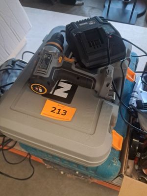 a picture of a tool box with a drill and other tools