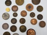 a lot of coins that are on the table