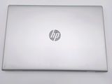 hp laptop computer sitting on a white surface with a white background