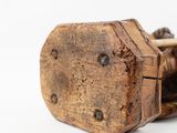 a small wooden object with a toothpick stuck in it