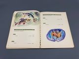 un livre sur lequel figurent une tortue et un poisson