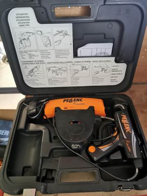 a tool in the case that is open on the floor