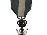 une image représentant une médaille ornée d'une étoile sur le recto