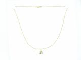 gold plated necklace with a small flower pendant on a chain