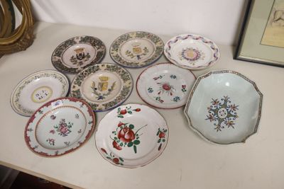 many plates that are sitting on a table