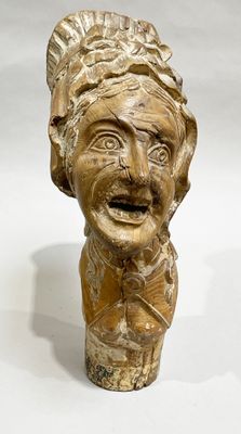 statue of a man with a hat on his head and a mustache
