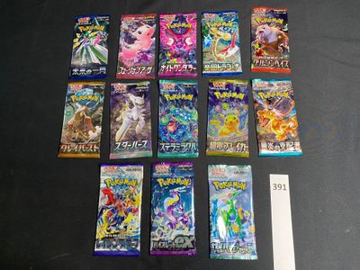 a lot of pokemon trading cards on a table