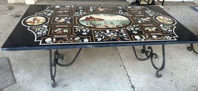 a table that has a picture on it in the middle of it