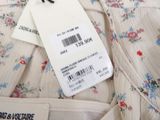 a close up of a dress with a price tag on it