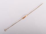 an image of a gold bracelet on a white background