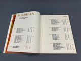 an open book on a table with a bunch of information on it