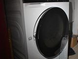 a washer and dryer in a small room