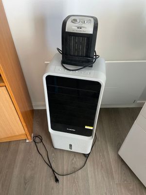 an image of a room with a heater on top of it