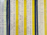 three michel michel timetables on display on a carpet