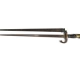 pair of two old fashioned swords on a white surface with a white background
