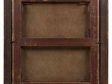 an old wooden frame with a brown canvas on it