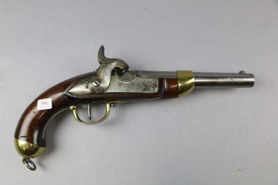 a close up of a gun on a table with a white background