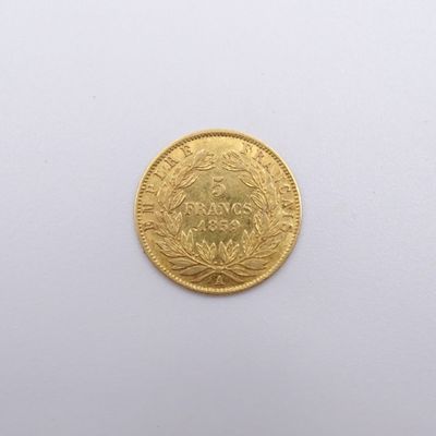 an image of a gold coin on a white surface