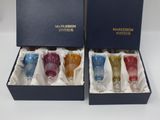 three boxed wine glasses in a blue box on a white surface