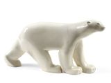 a white polar bear figurine on a white background