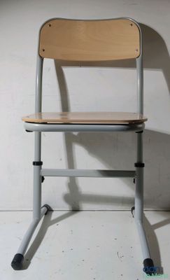 a chair that is sitting in the corner of a room