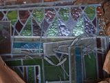 a picture of a broken stained glass window in a box