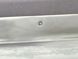 a close up of a sink with a hole in it