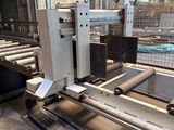an image of a machine that is working on a piece of paper