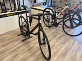 two bikes that are on display in a bike shop